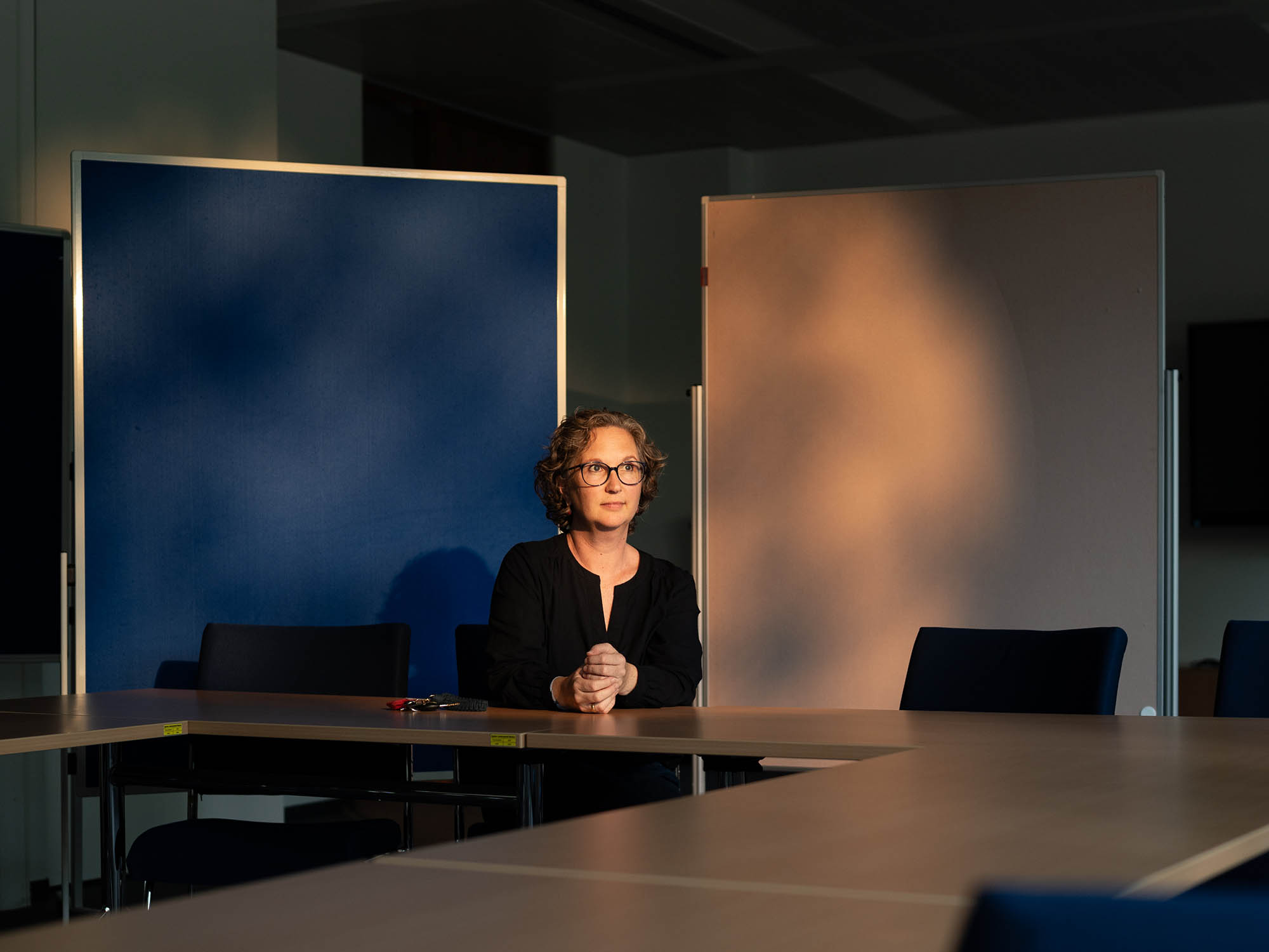 4 - Susi poses for the portrait in a conference room at the Youth Welfare Office - 0236918.jpg